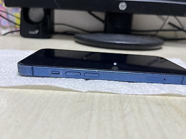 telefon a 72: IPhone 13, Mavi, Face ID — 5