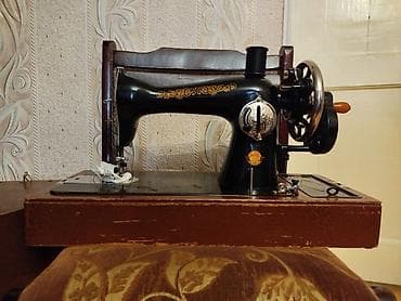 Klassik mexaniki tikiş maşını - Gövdə: Döküm metal, qara lak örtük və