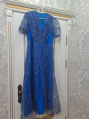 Mavi rəngdə ziyafət paltarı - Model: V-yaxa, beldən yüngül açılan