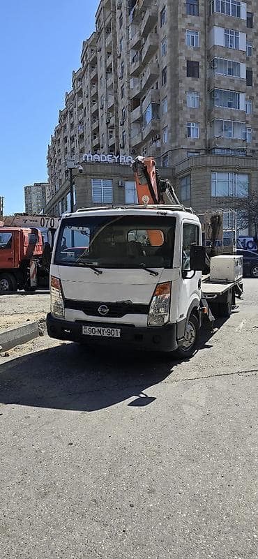 SATILIR.Nissan Cabstar Avtokran-avtosəbəti yuxarı hündürlüklərdə