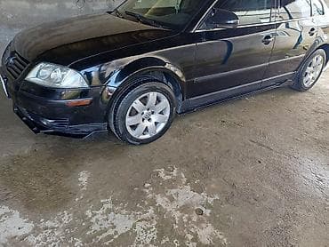 kia optima spoyler: Volkswagen Passat: 1.8 l | 2004 il Sedan — 3