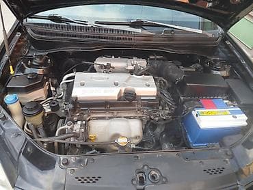mini cooper 2009: Kia Rio: 1.4 l | 2008 il Sedan — 1