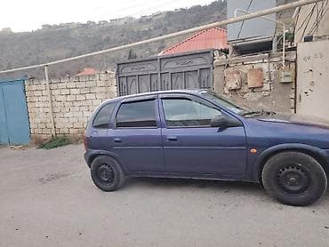 opel astara: Opel Corsa B, 5 qapı, tünd mavi rəng. Əsas xüsusiyyətlər: - Kuzov — 4