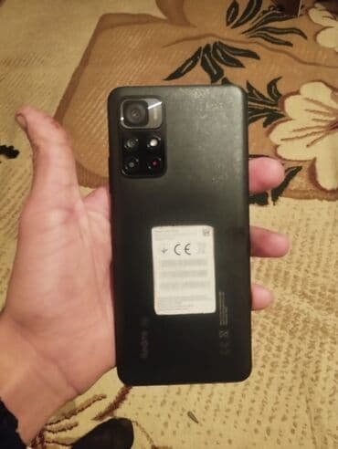 xiaomi mi 910: Xiaomi Redmi smartfon - Arxa paneldə “Redmi” loqolu, mat qara korpus — 1