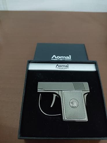 Пистолет зажигалка Lomai изготовлен из металла. Компактная мини