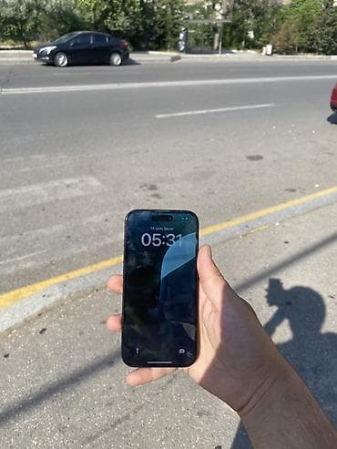 panel cit: IPhone 15, 256 GB, Qara, Face ID — 2