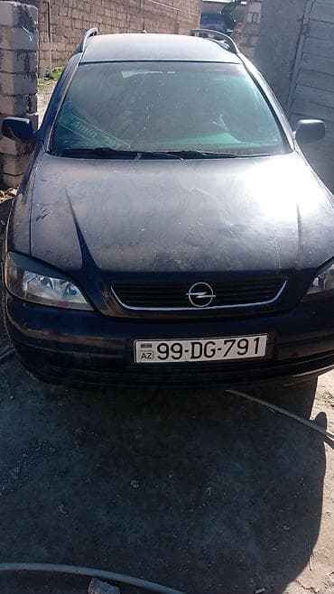 Avtomobil satışı: Opel Astra karvan (universal) – mavi rəng Mühüm xüsusiyyətlər: - — 5