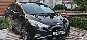 Kia Cerato sedan – qara rəng, AZ nömrə nişanı. Texniki və komfort