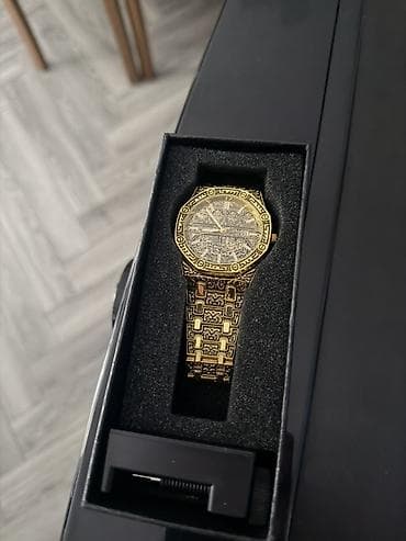 120 manata alinib 50 manata satilir Qızılı rəngli kişi qol saatı –