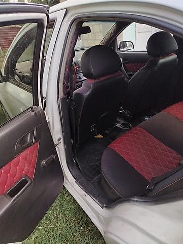 santa fe 2008: Chevrolet Aveo: 1.4 l | 2010 il 263000 km Sedan — 10