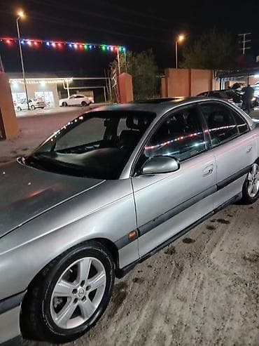 qazel radiator: Opel Omega: 2 l | 1996 il 300000 km Sedan — 1
