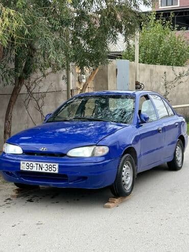 kia sou 2013: Hyundai Accent: 1.5 l | 1995 il Sedan — 1