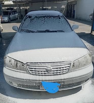 guzgu manitor: Nissan Sunny (N16) sedan – ağ rəng Xüsusiyyətlər: - Kuzov: 4 qapılı — 5
