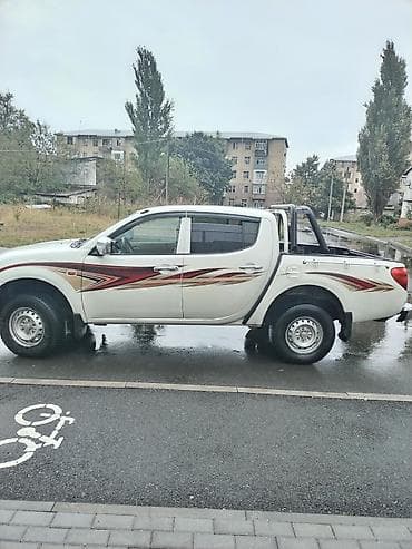 brabus disk: Mitsubishi L200: 2.4 l | 2008 il 302118 km Pikap — 4