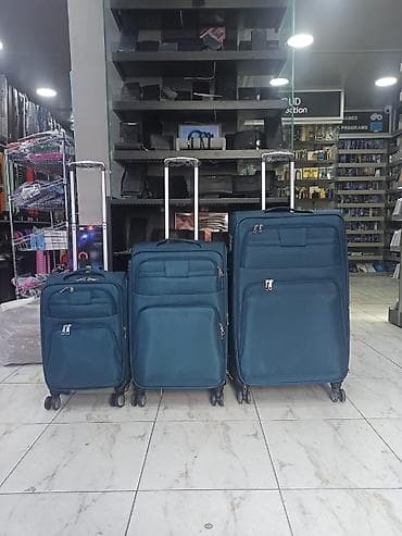 tekerli çantalar: Səyahət çamadan dəsti – 3 ölçü - Rəng: tünd mavi/teal - Dəst tərkibi — 1