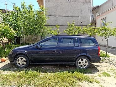 ford focus rs: Opel Astra Caravan (universał) – tünd mavi rəng, 5 qapı, geniş baqajlı — 2