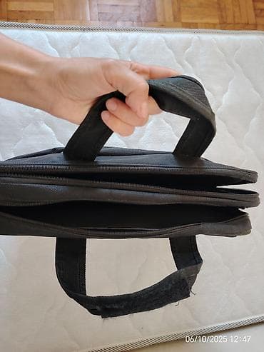 Zərgərlik əşyaları: Notebook cantasi yaxsi veziyyetdedir unvan xetai metro ve ya ecemi — 2