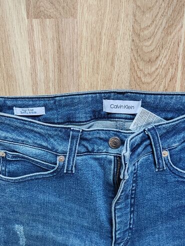 goy daş: Tünd göy rəngli, hündürbel ayağı azca sacaqli qadın cins şalvari az — 2