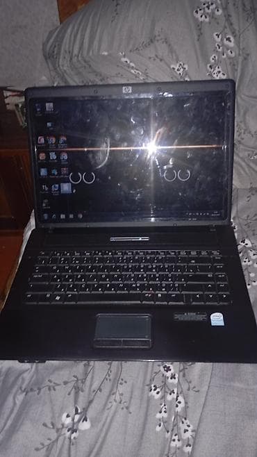 televizor ekran: HP noutbuk - Model: HP Compaq (alt hissədə “HP DriveGuard” qeyd — 1