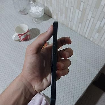 2.el macbook: İPHONE 13 Ayfon 13 satılır.Ekranda çızıxlar var,və çatdağ,Korpusta — 7