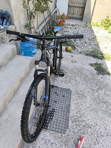 Dağ velosipedləri: Dağ velosipedi – STARK (model üzərində “Slick/29” və “Stark” yazıları — 2