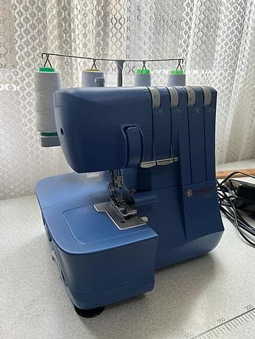 muzkalni centir: Tikiş maşını Müğənni, İşlənmiş,Overlok, 4 saplı, Ünvandan götürmə — 2