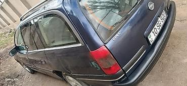Opel: Opel Astra F Caravan (universal), tünd mavi rəng. - Kuzov: universal — 6
