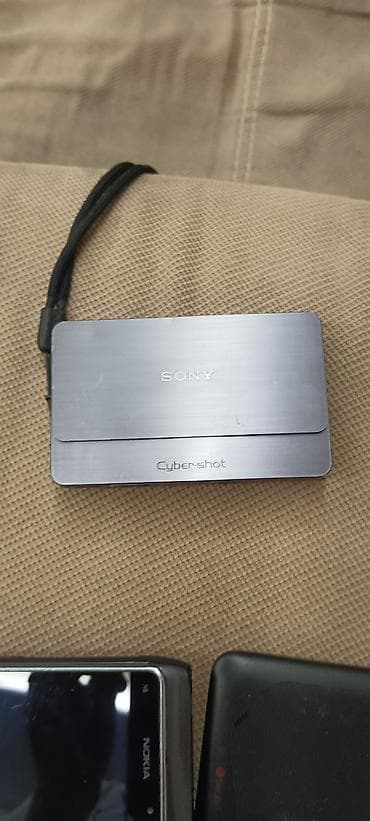 sony mp3 player: Sony Cyber-shot rəqəmsal fotoaparat - Kompakt metal gövdə, sürüşən ön — 2