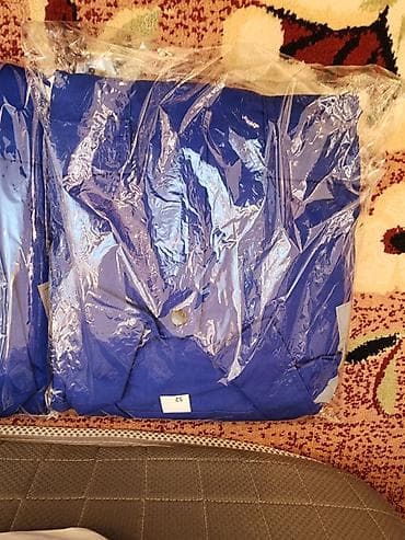 canta modelləri: Mavi rəngli kişi kostyumu – paketlənmiş halda. mavi kamizonlar 35 — 6