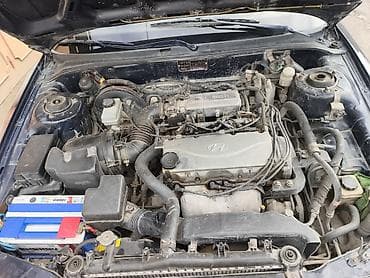 Hyundai Sonata sedan - Kuzov: 4 qapılı sedan, tünd mavi rəng -