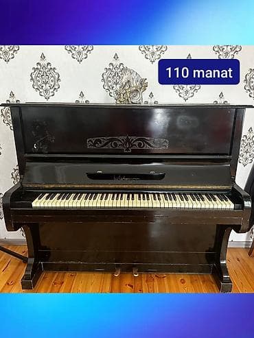 Upright pianino – klassik qara korpus, 88 klavişa və 2 pedal. Taxta