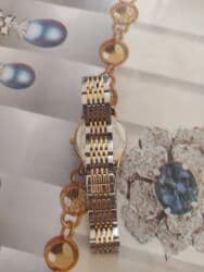 красивые платья на прокат в баку: İkirəngli klassik qol saatı - Korpus: qızılı tonlu dairəvi korpus — 2