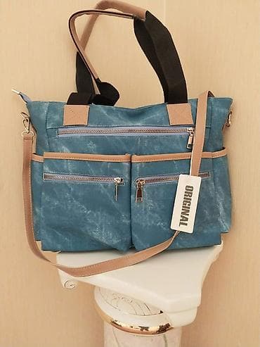 Mavi rəngli çoxcibli çanta - Material: parça əsaslı korpus, açıq bej