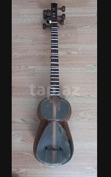 Bahadur tarı.Tam professional alətdi.Super səs temri var.İri — 6