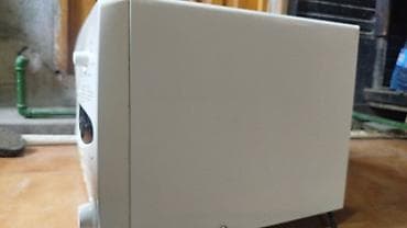 samsung a32 case: LG mikrodalğalı soba – ağ korpus, ön şüşə pəncərə və sağ tərəfdə — 3