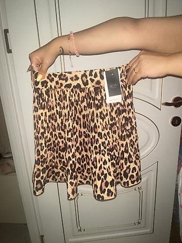 koja etek: Brend: QUZU S M razmer Model: qısa ətək Naqış: leopard printi — 2