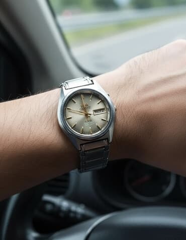 qol satlari: İşlənmiş, Qol saatı, Orient, rəng - Gümüşü — 1