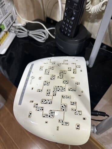 modem fiber optik: TP-Link simsiz marşrutlaşdırıcı, evdə və ya kiçik ofisdə internet — 4