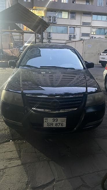 klas 6: Nissan Sunny: 1.6 l | 2008 il Sedan — 1
