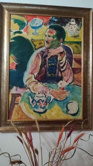 maraqlı rəsmlər: Bu tablo, oturmuş bir adamın yağlı boya rəsmini təqdim edir. Tabloda — 1