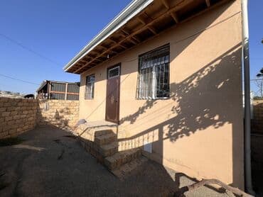 загородный дом с гаражом: 2 комнаты, 75 м² — 1