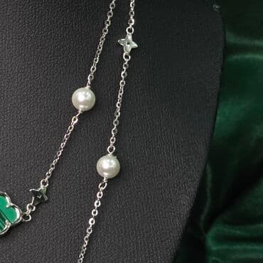 xari bulbul simvolu: Boyunbağı, Gümüş — 3