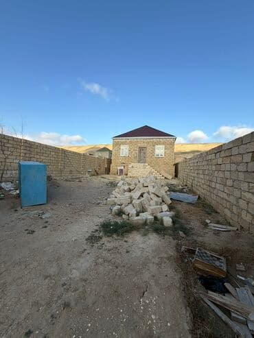 hökməli: 4 otaqlı, 100 kv. m, Orta təmir — 2