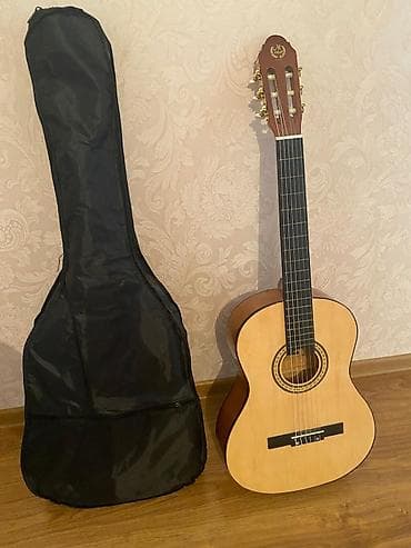 Gitara alinib istifade edilmeyib tezedi ciziqda yoxdu her biri 170 azn
