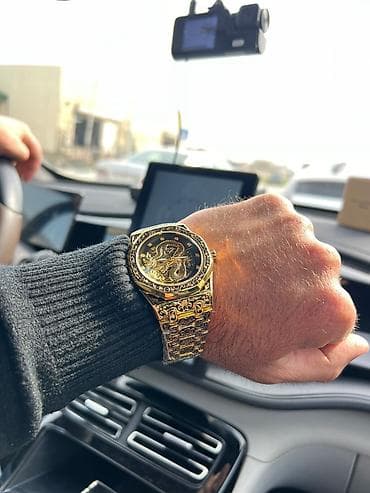 Qızılı rəngdə mexaniki kişi qol saatı - Korpus və qolbaq: qızılı — 1