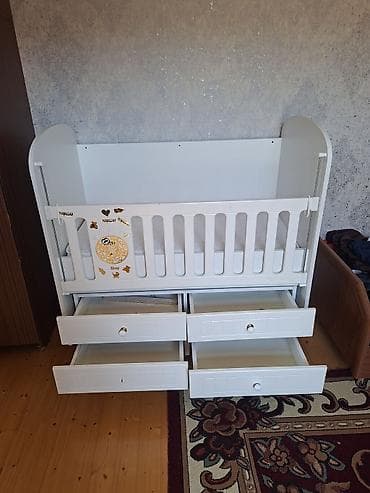 Ağ rəngli uşaq beşiyi – matrasla birlikdə. Xüsusiyyətlər: - Material — 4