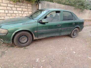 опель зафира а: Yaşıl rəngli Opel Vectra sedan avtomobili etibarlı nəqliyyat vasitəsi — 2