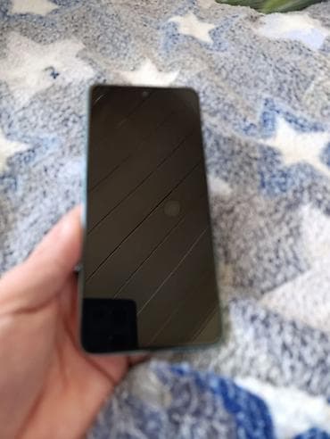 kredit telefon satisi: Smartfon – tam ekranlı dizayn, ön kameraya görə mərkəzdə dəlikli — 1