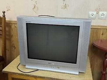 Kineskop televizor (Rexant/Flano markalanması görünür), gümüşü korpus