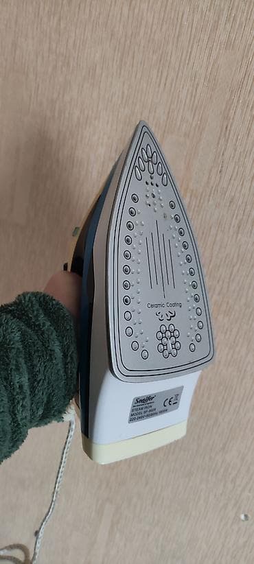 Elektronika: Sonifer buxarlı ütü. Model: SF-9028 Gərginlik: 220–240V, 50/60Hz — 1
